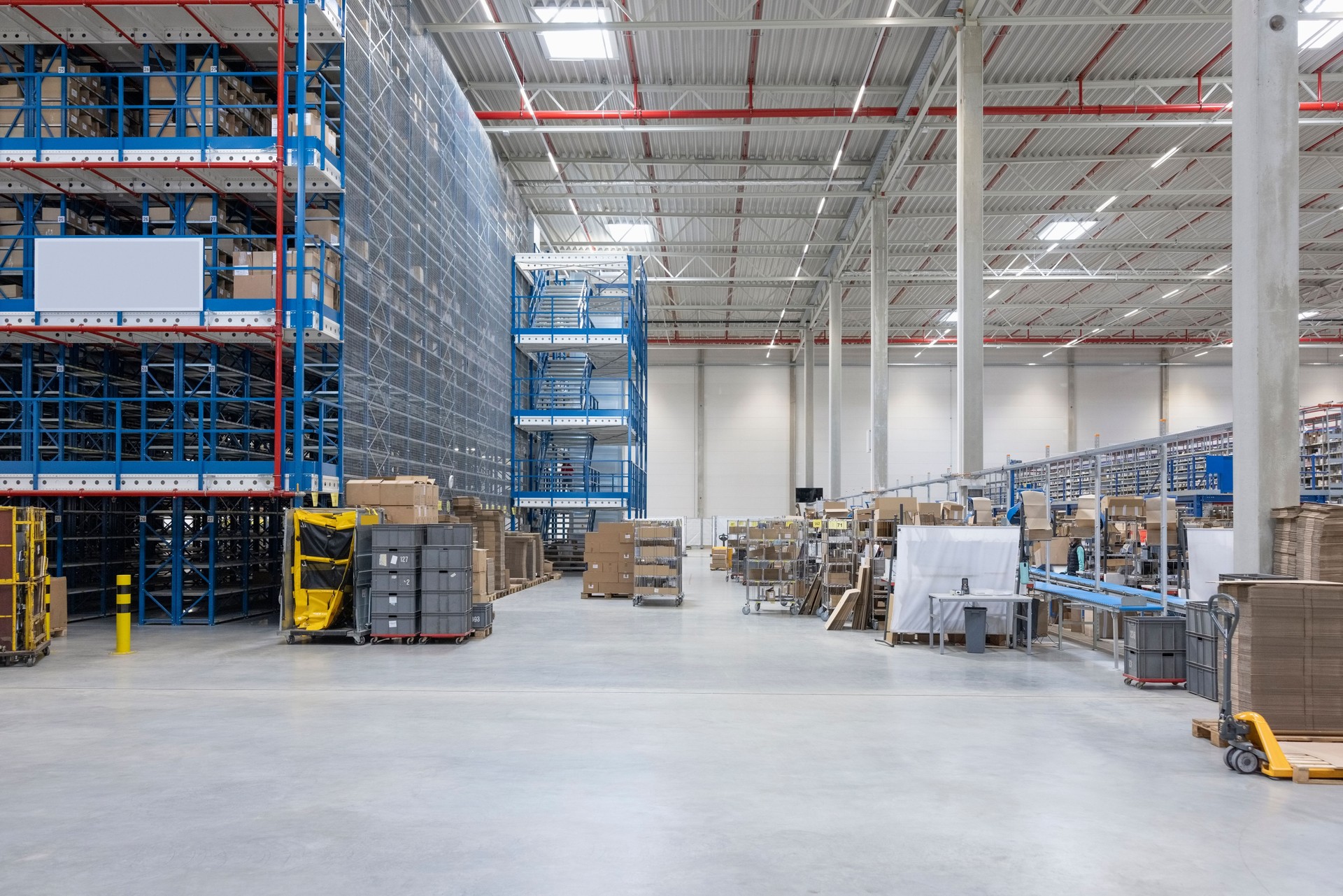 Distribution warehouse interior with boxes on racks